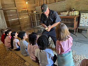 Commissioner Germann, Pct. 4, educates area children on animals and agriculture 